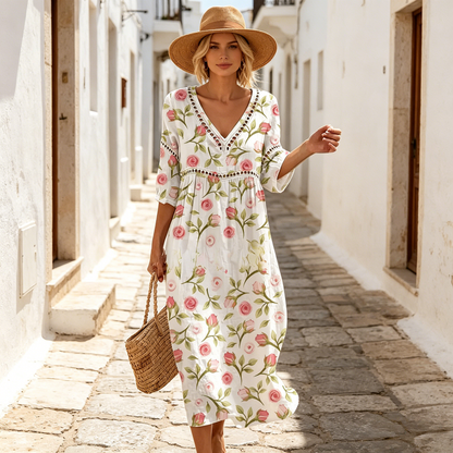 Vestido largo de algodón y lino con estampado floral, estilo veraniego, escote en V, cintura definida.
