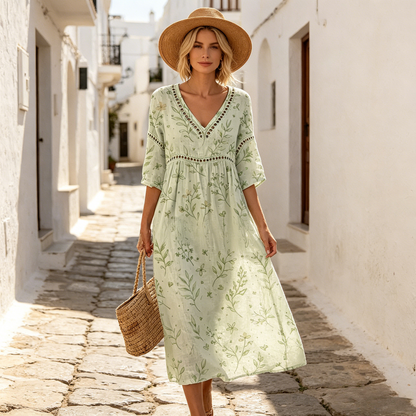 Vestido largo de algodón y lino con estampado floral, estilo veraniego, escote en V, cintura definida.